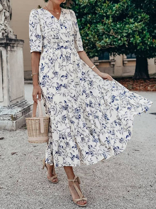 Sunset Vacation  Ruched Tiered Floral Half Sleeve Dress