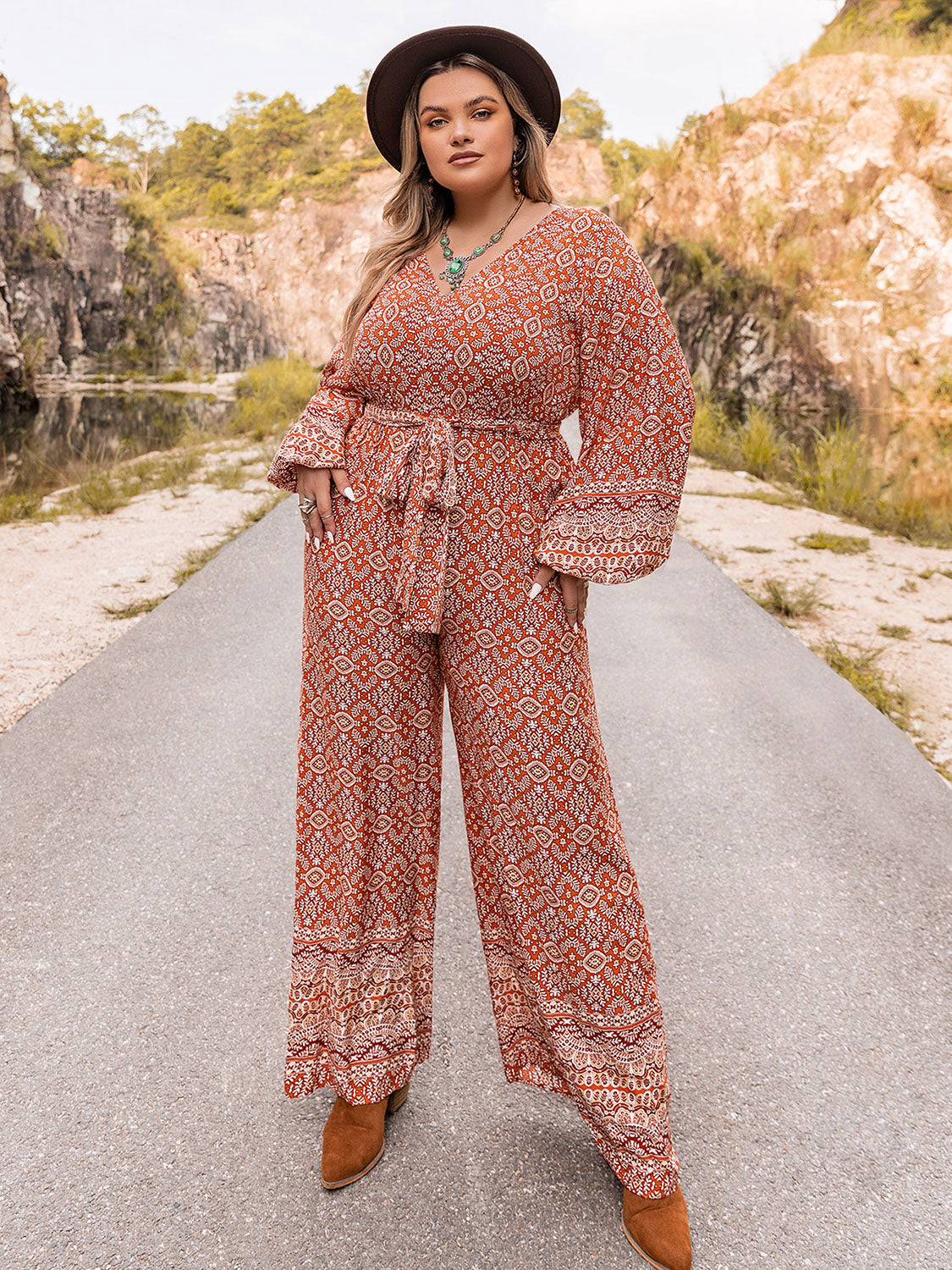 Plus Size Printed V-Neck Tie Front Balloon Sleeve Jumpsuit Sunset and Swim Floral 0XL 