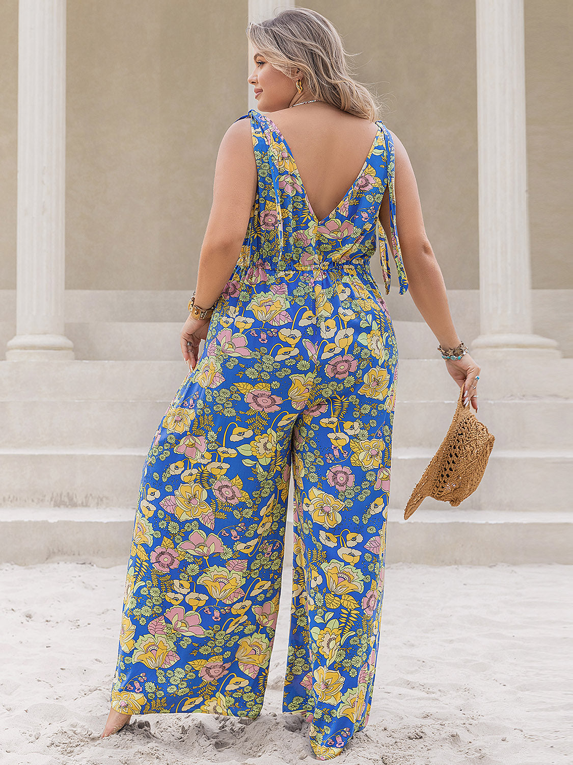 Plus Size Printed V-Neck Wide Leg Jumpsuit Sunset and Swim   