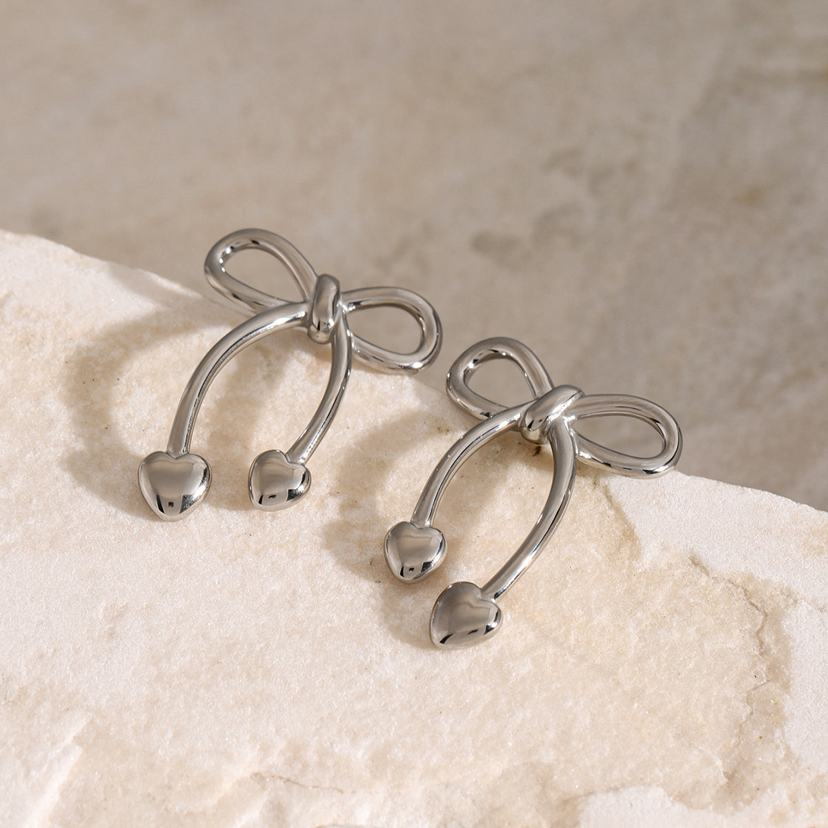 Stainless Steel Bow Earrings Sunset and Swim   