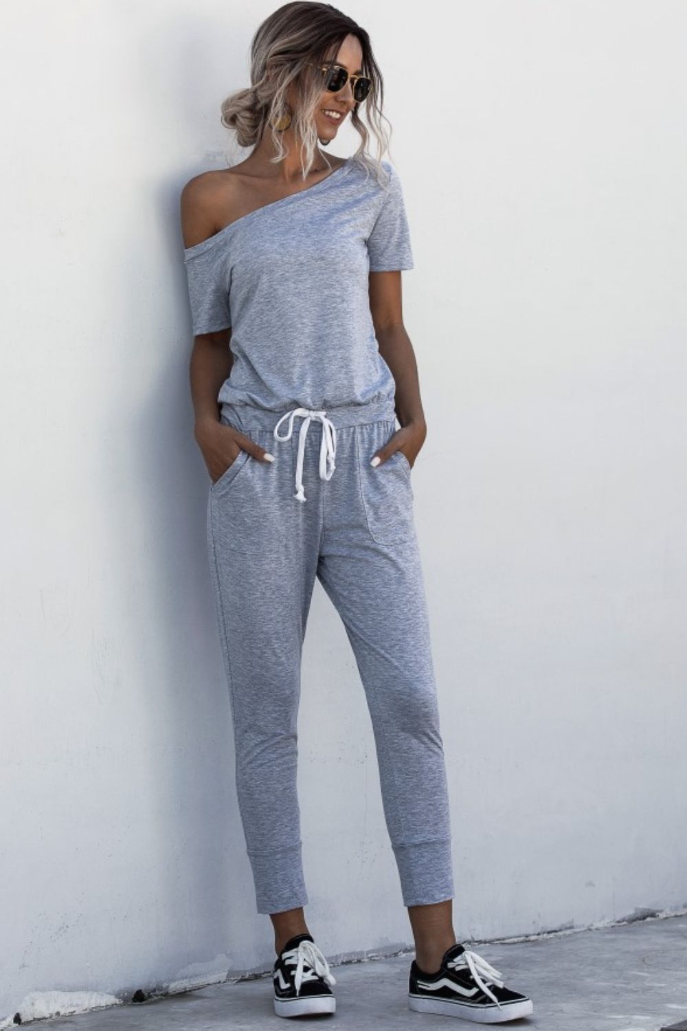 Asymmetrical Neck Tied Jumpsuit with Pockets  Sunset and Swim   