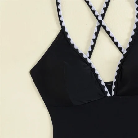 Elegant Black Swimsuit with Chic Sarong and Strappy Detail - Image 5