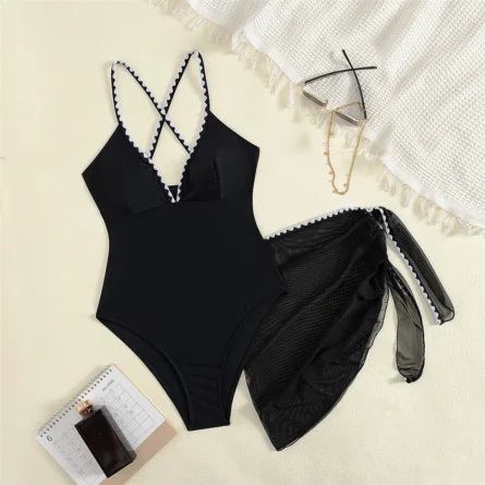 Elegant Black Swimsuit with Chic Sarong and Strappy Detail - Image 2