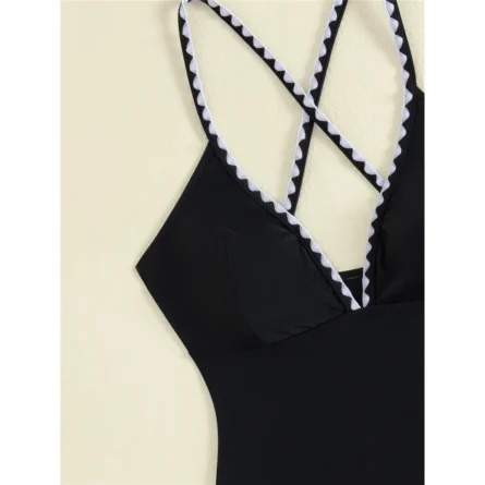 Elegant Black Swimsuit with Chic Sarong and Strappy Detail - Image 4