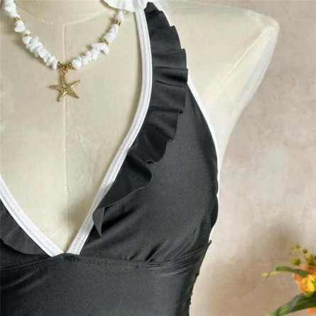 Chic Black Ruffled Swim Dress for Effortless Beach Elegance - Image 9